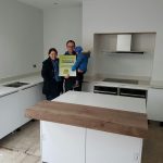 bianco de lusso quartz worktops with wooden breakfast bar