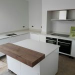 bianco de lusso quartz worktops with wooden breakfast bar