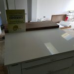 bianco de lusso quartz worktops with wooden breakfast bar