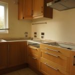 nebbia grigia quartz worktops installed in oak kitchen