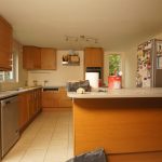 nebbia grigia quartz worktops installed in oak kitchen