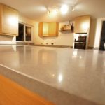 nebbia grigia quartz worktops installed in oak kitchen