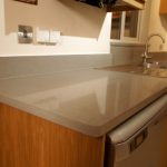 nebbia grigia quartz worktops installed in oak kitchen