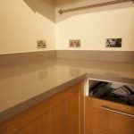 nebbia grigia quartz worktops installed in oak kitchen