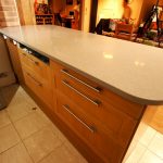 nebbia grigia quartz worktops installed in oak kitchen