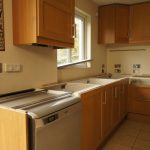 nebbia grigia quartz worktops installed in oak kitchen