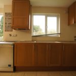 nebbia grigia quartz worktops installed in oak kitchen