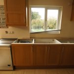 nebbia grigia quartz worktops installed in oak kitchen