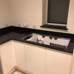 nero venata black quartz worktops in kitchen