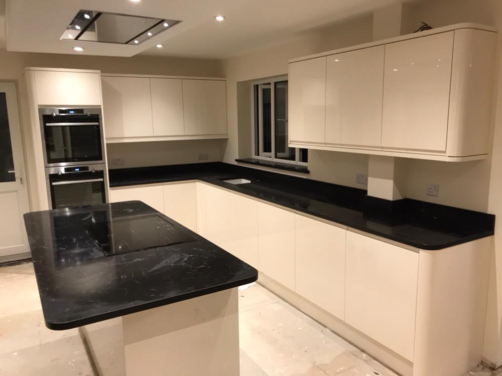 nero venata black quartz worktops in kitchen