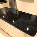 nero venata black quartz worktops in kitchen