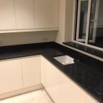 nero venata black quartz worktops in kitchen