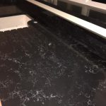 nero venata black quartz worktops in kitchen