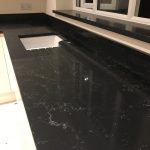 nero venata black quartz worktops in kitchen