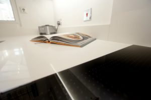 bianco puro pure white quartz worktops in taupe high gloss kitchen