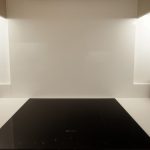 bianco puro pure white quartz worktops in taupe high gloss kitchen