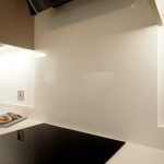 bianco puro pure white quartz worktops in taupe high gloss kitchen