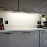 bianco puro pure white quartz worktops in taupe high gloss kitchen