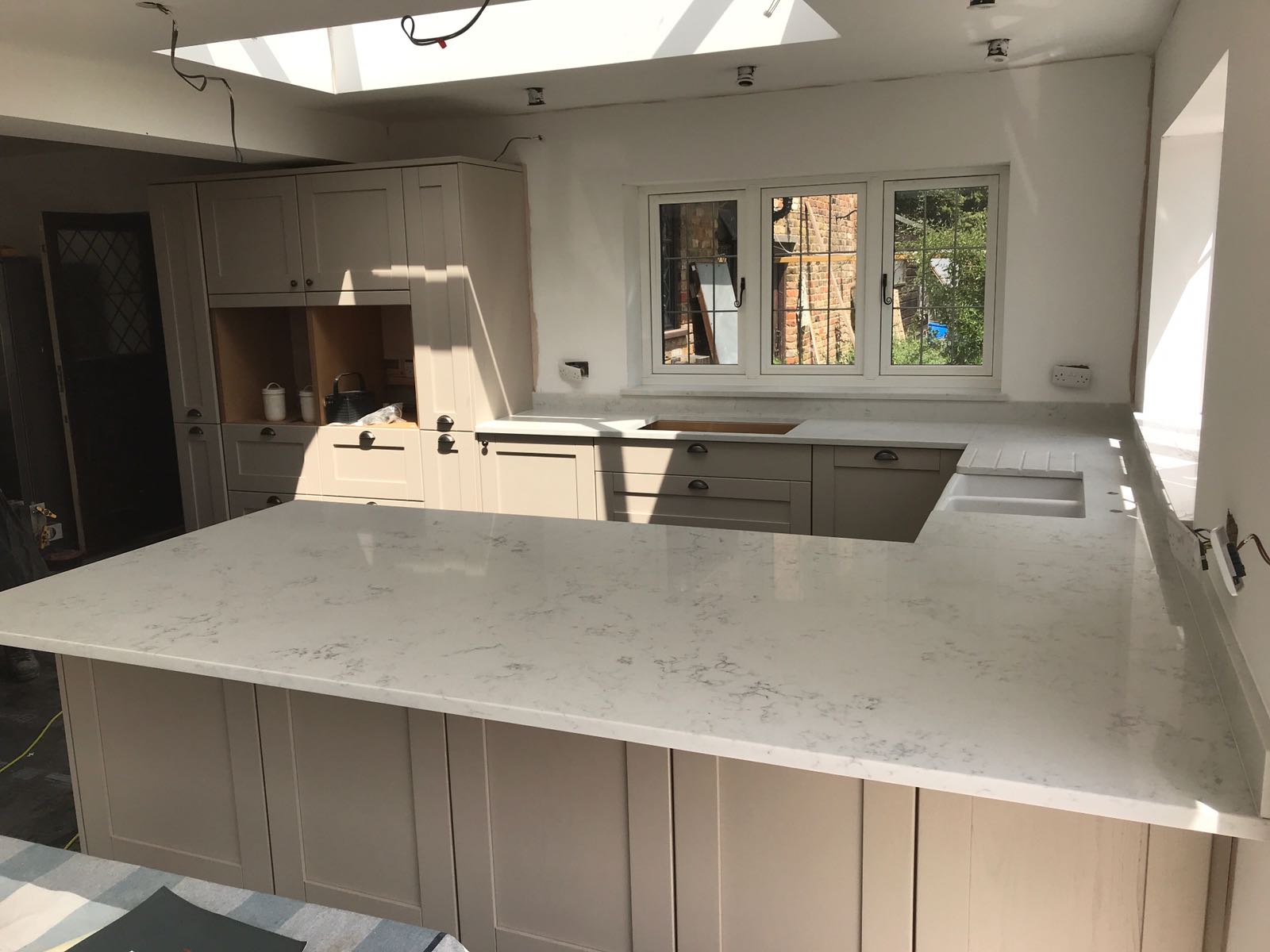 Kitchen of the week… Located in Rickmansworth, Herts, showcasing the Monaco  Carrera - Rock & Co Granite and Quartz Worktops