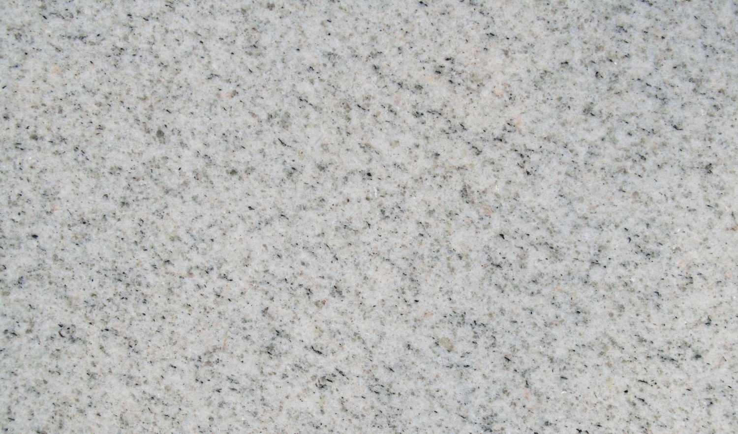 Imperial White granite sample showing the natural surface pattern