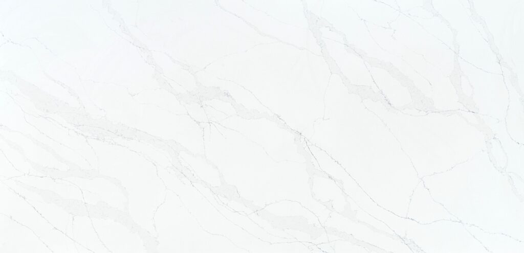 Calacatta Prestige quartz worktop sample – bright white with fine grey veining and soft grey marble drifts
