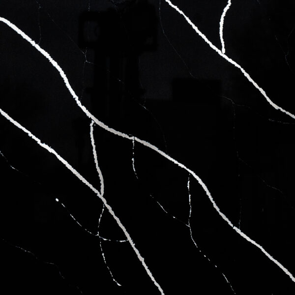 Nero Marquina quartz worktop sample – jet black with bold white diagonal veining