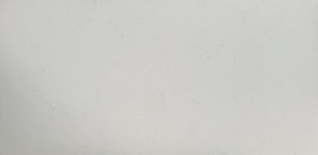 Velvet Carrara quartz worktop sample – soft white with faint fine grey flecks and veining