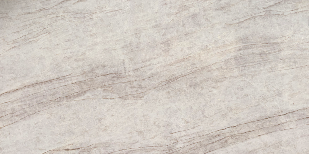 Taj Mahal quartz worktop sample – warm white with soft gold and beige veining
